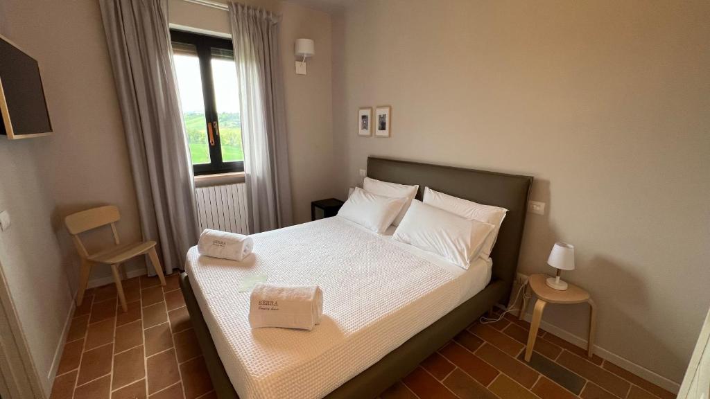 Posteľ alebo postele v izbe v ubytovaní Serra Country House