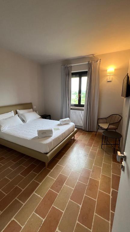 Posteľ alebo postele v izbe v ubytovaní Serra Country House