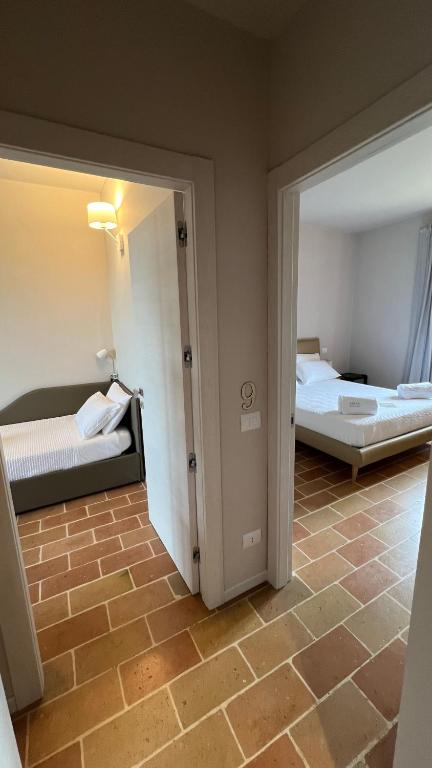 Posteľ alebo postele v izbe v ubytovaní Serra Country House