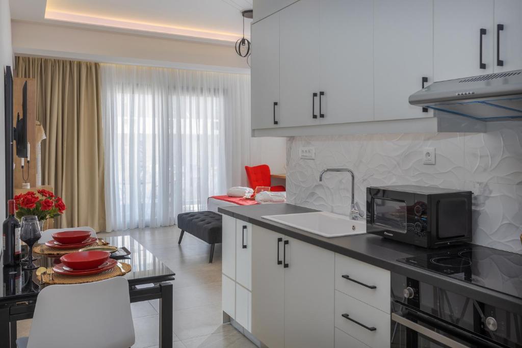 Kuchyň nebo kuchyňský kout v ubytování Marquise Residences by Estia
