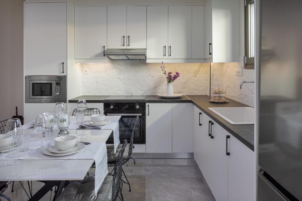 Kuchyň nebo kuchyňský kout v ubytování Marquise Residences by Estia