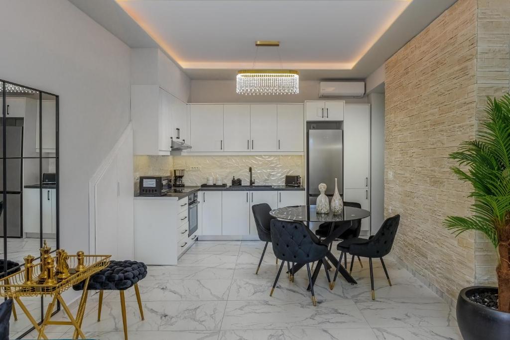 Kuchyň nebo kuchyňský kout v ubytování Marquise Residences by Estia