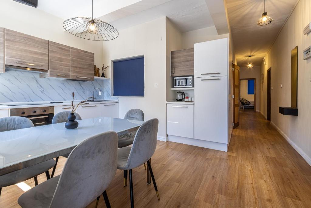 Kuchyň nebo kuchyňský kout v ubytování Park Lane Boutique Aparthotel