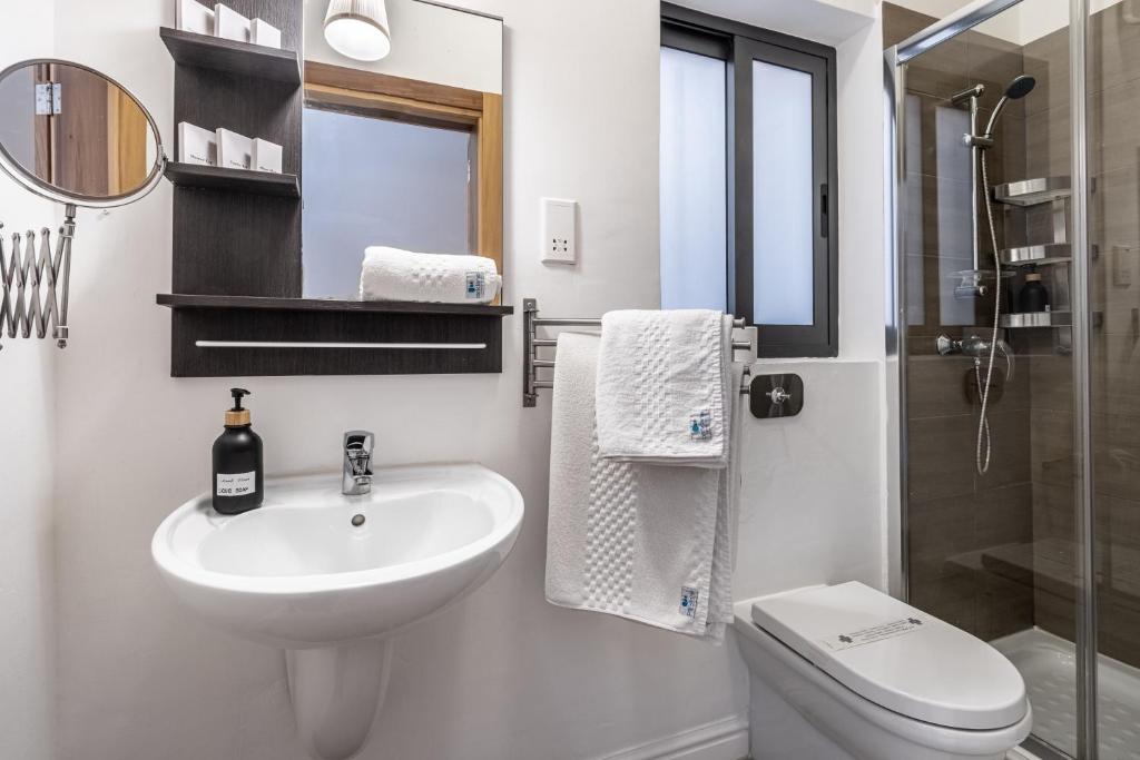 Koupelna v ubytování Park Lane Boutique Aparthotel