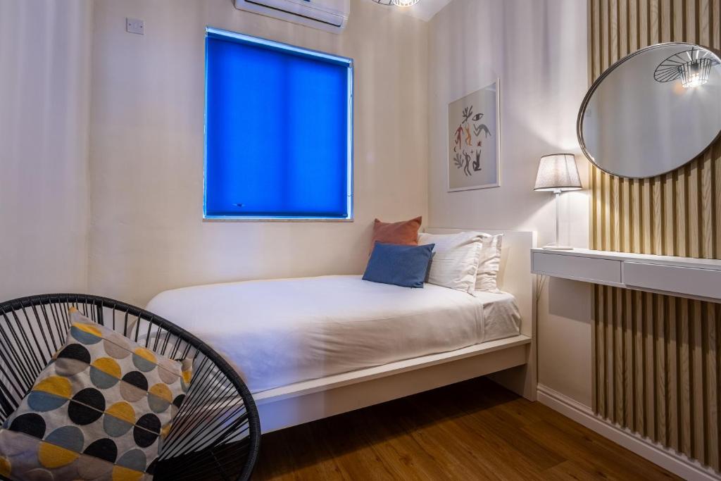 Postel nebo postele na pokoji v ubytování Park Lane Boutique Aparthotel