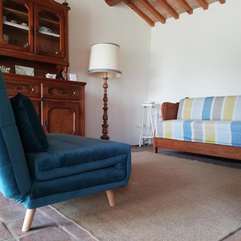 A seating area at Dependance Sangiantofetti-Rigon