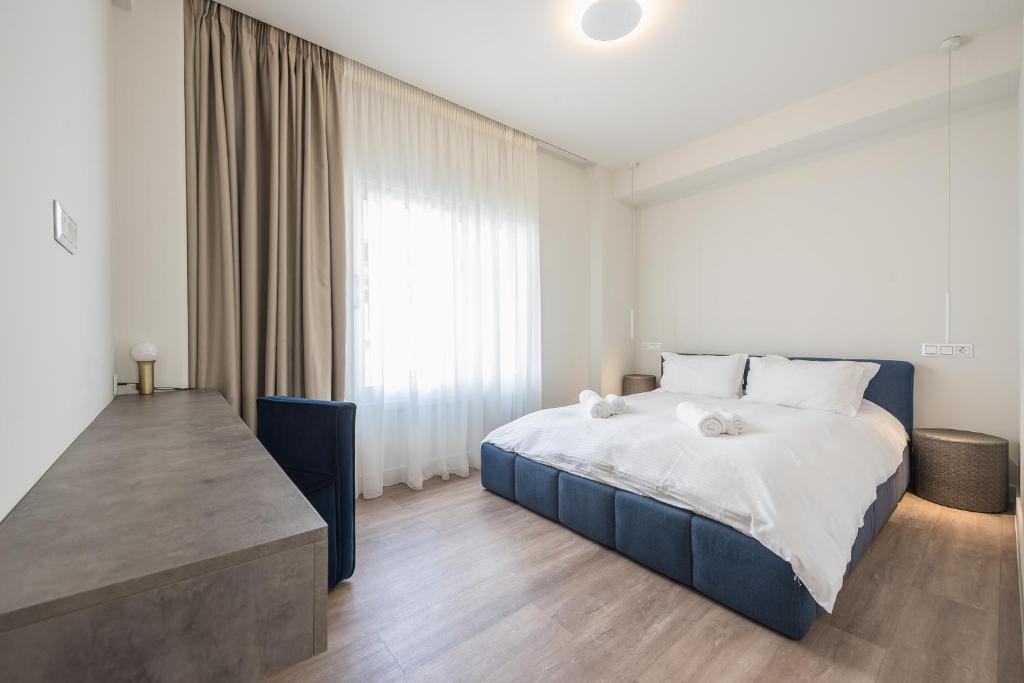 Postel nebo postele na pokoji v ubytování Aeiphoria Suites & Rooms - Athens