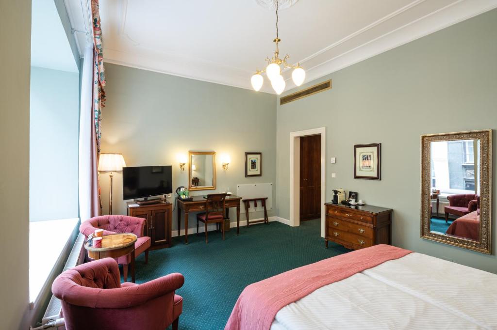 Postel nebo postele na pokoji v ubytování Hotel Liberty