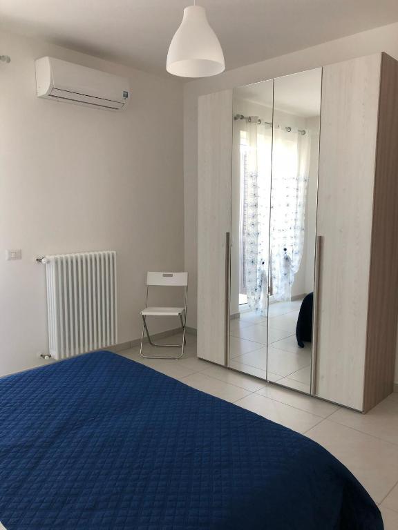 Postel nebo postele na pokoji v ubytování Petali Rosa- Dimora Orizzonte vista mare