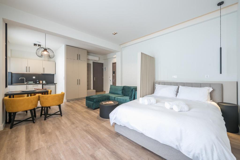 Postel nebo postele na pokoji v ubytování Aeiphoria Suites & Rooms - Athens