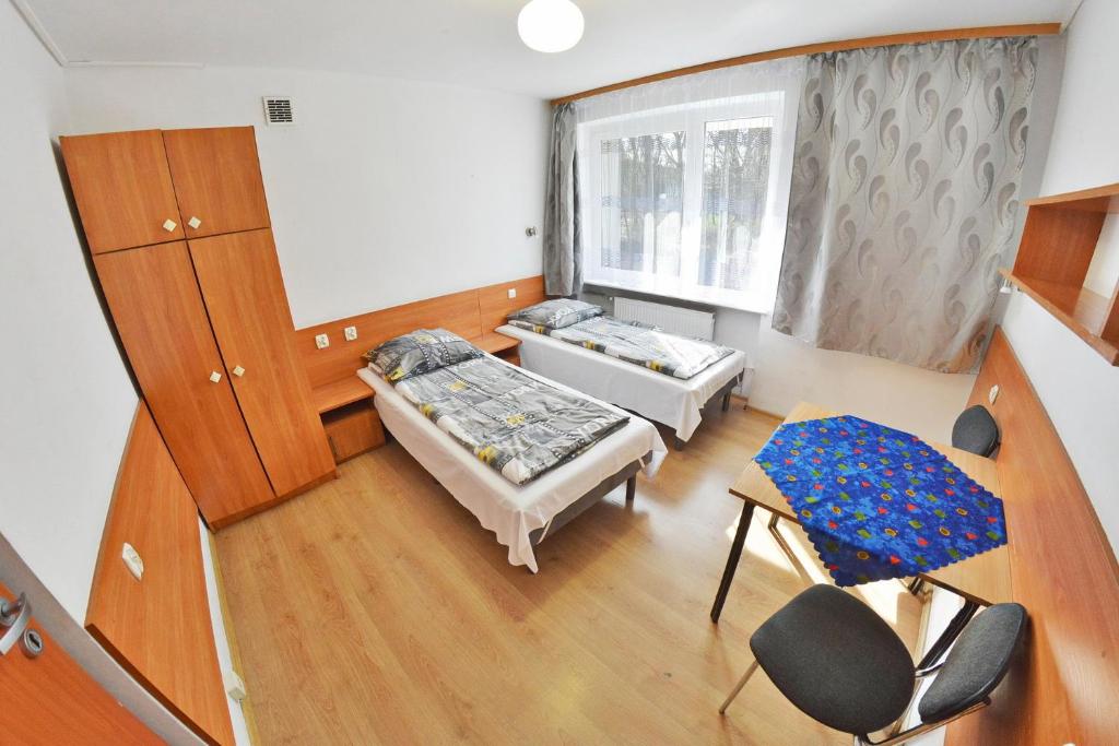 Postel nebo postele na pokoji v ubytování Twój Hostel Ruda Śląska