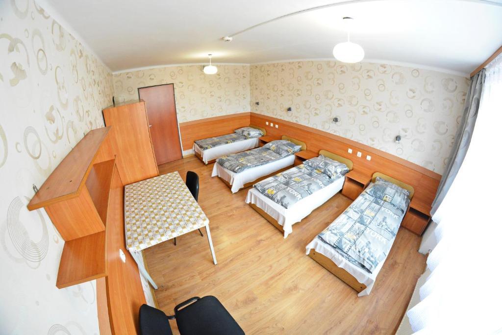 Postel nebo postele na pokoji v ubytování Twój Hostel Ruda Śląska
