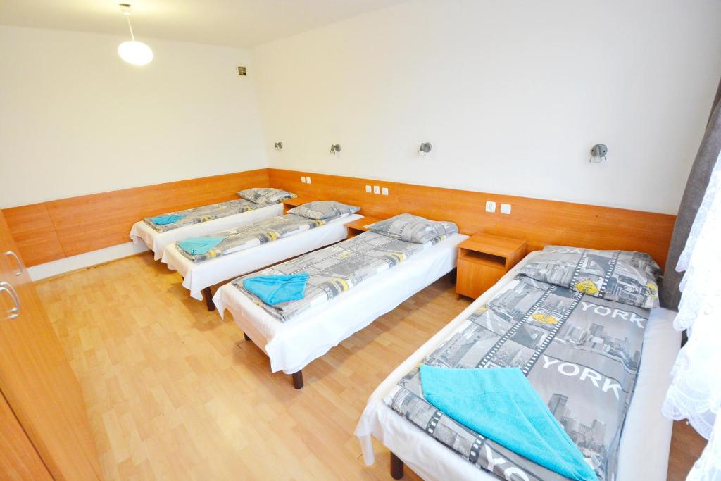 Postel nebo postele na pokoji v ubytování Twój Hostel Ruda Śląska