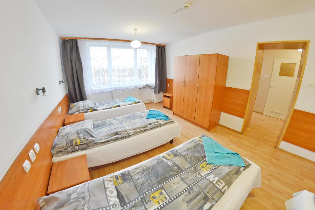 Postel nebo postele na pokoji v ubytování Twój Hostel Ruda Śląska