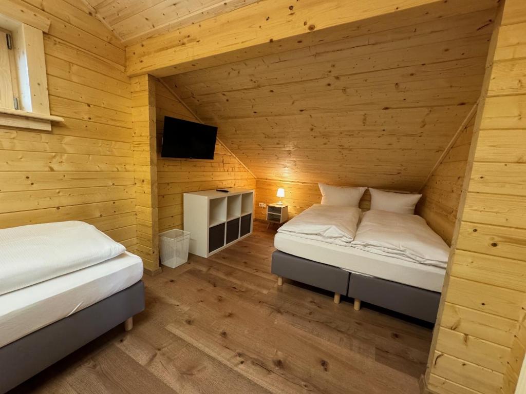 Postel nebo postele na pokoji v ubytování Hotel Hochfirst