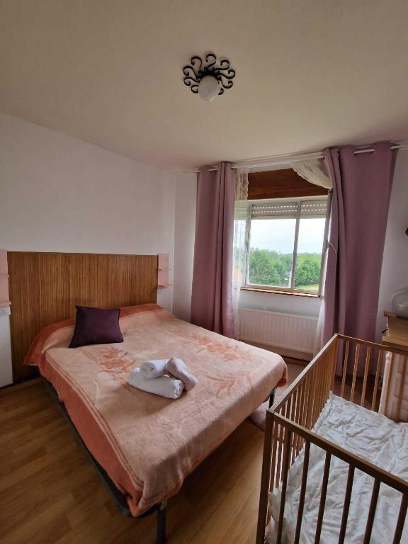 Postel nebo postele na pokoji v ubytování Vivienda Vacacional Villa Cobijero