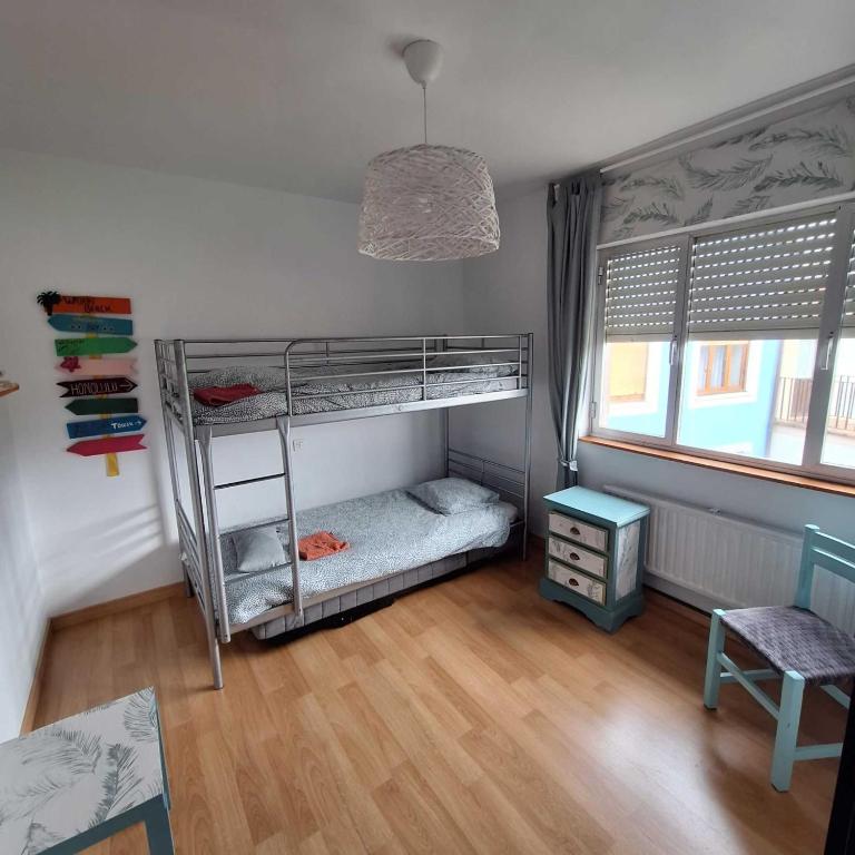 Postel nebo postele na pokoji v ubytování Vivienda Vacacional Villa Cobijero