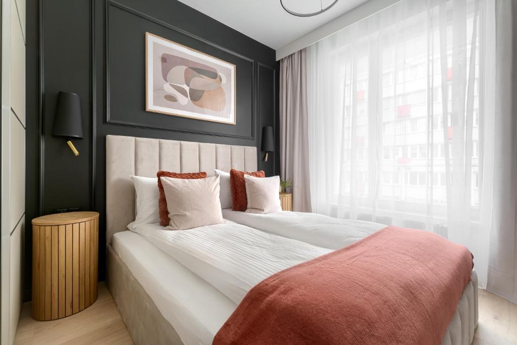 Postel nebo postele na pokoji v ubytování MARGI Jolly BEAUTI LUX Apartament