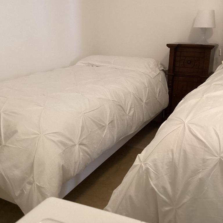 Postel nebo postele na pokoji v ubytování Crispi 10