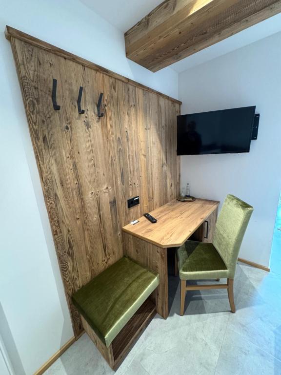 TV a/nebo společenská místnost v ubytování Hotel Gasthof zum Wulfen