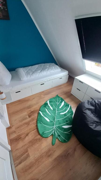Postel nebo postele na pokoji v ubytování Ferienwohnung Dschungel