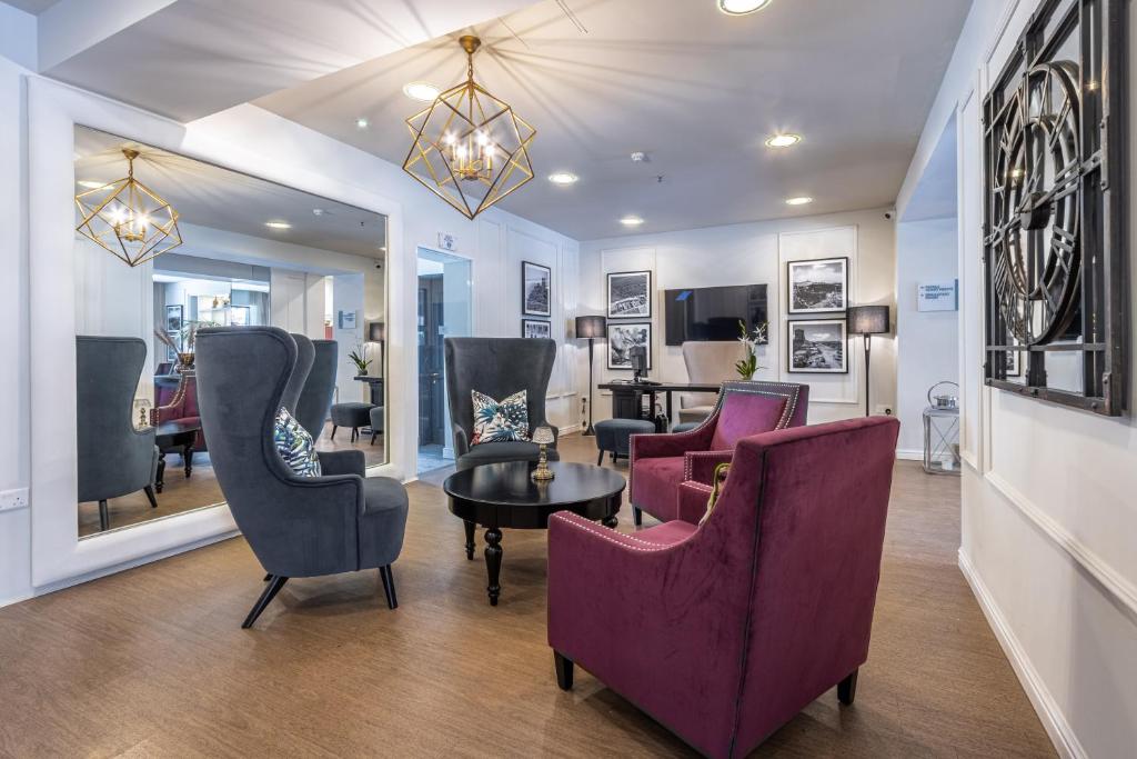 TV a/nebo společenská místnost v ubytování Park Lane Boutique Aparthotel