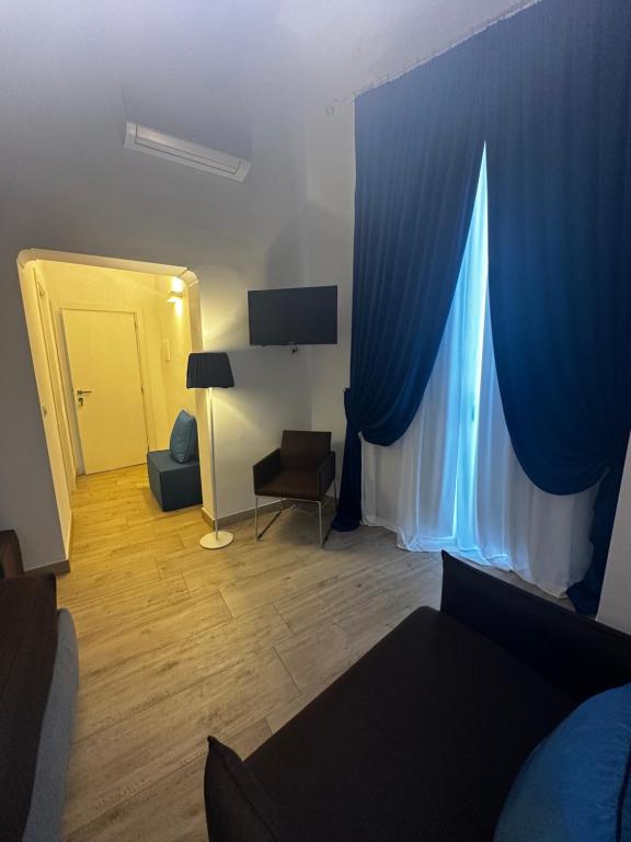 TV a/nebo společenská místnost v ubytování B&B Sigò