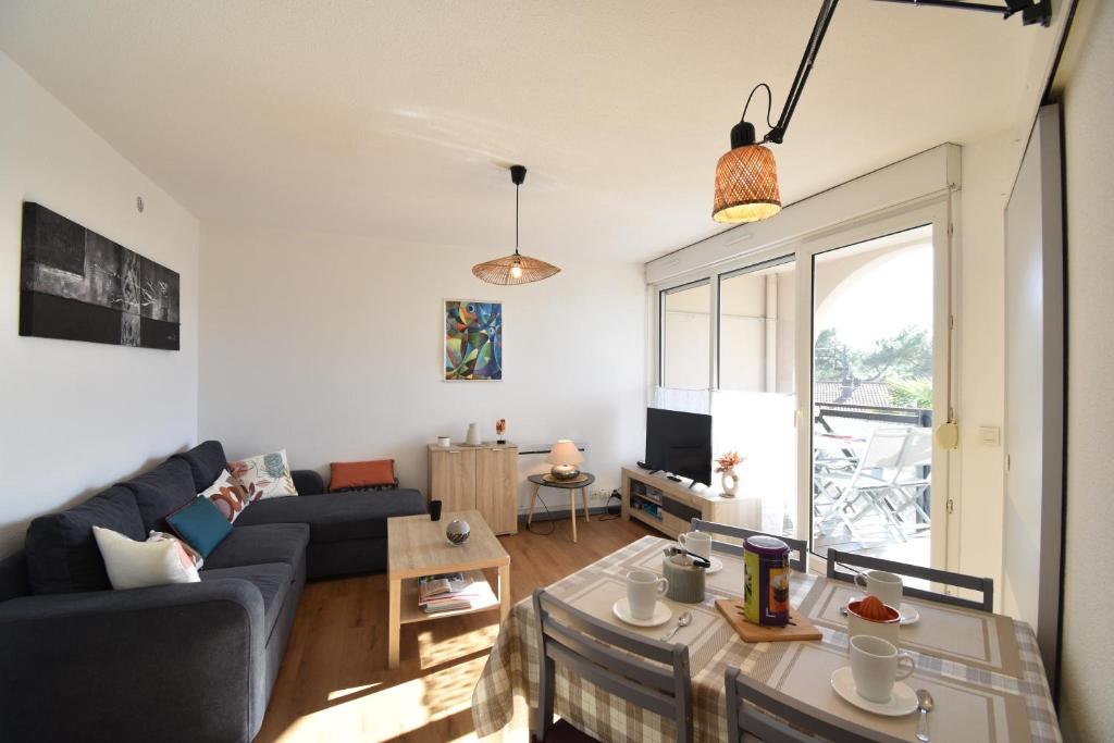 Een zitgedeelte bij Point d&#39;or L21 - Hossegor appartement 4 personnes plage piscine