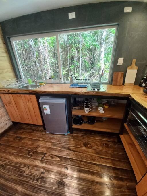 Kuchyň nebo kuchyňský kout v ubytování En Bosque, con Río, sin vecinos y Wifi Starlink