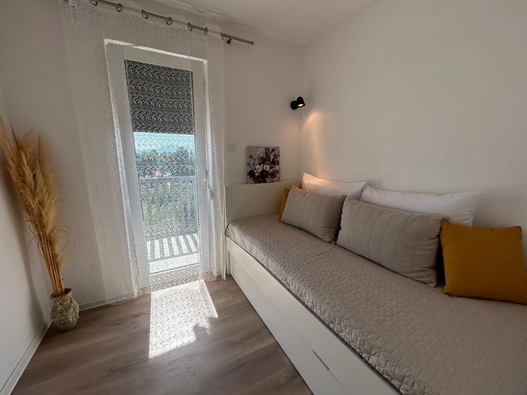 Posteľ alebo postele v izbe v ubytovaní Villa Dražana