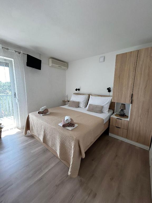 Posteľ alebo postele v izbe v ubytovaní Villa Dražana