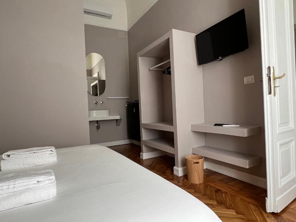 TV a/nebo společenská místnost v ubytování Turin Central Cavour