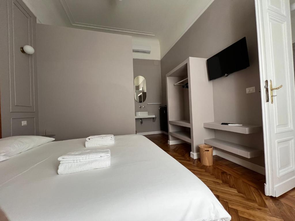 Postel nebo postele na pokoji v ubytování Turin Central Cavour