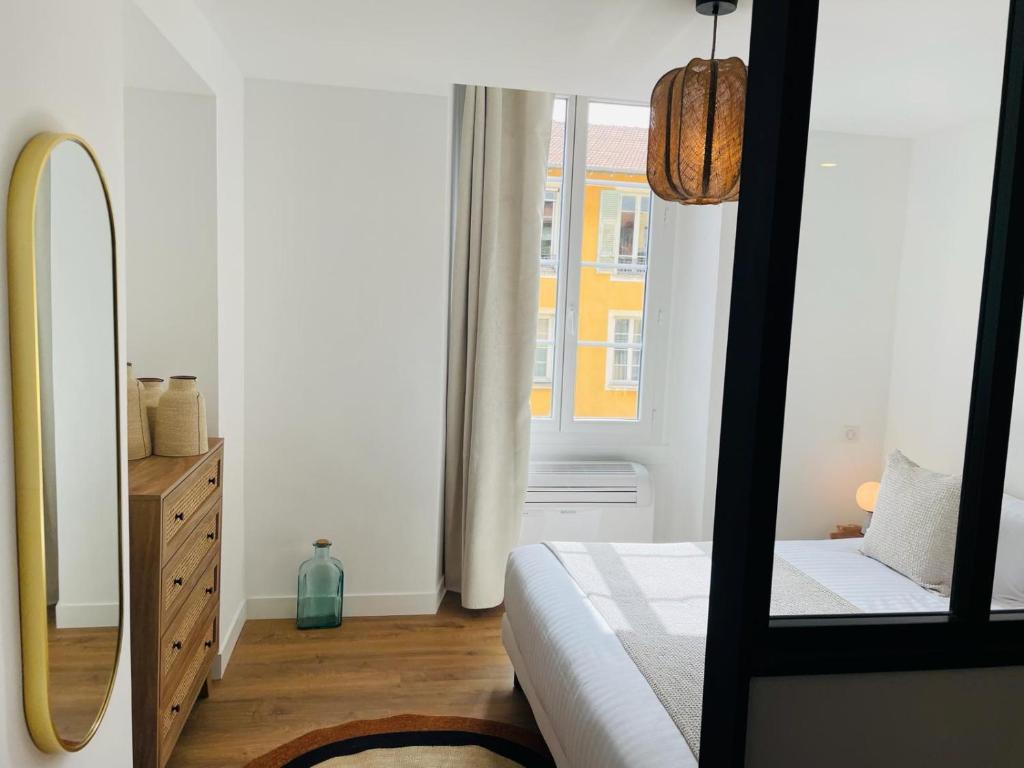 Katil atau katil-katil dalam bilik di Appartements Hotel le G