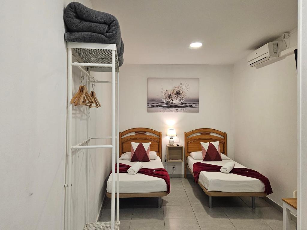 Cama o camas de una habitación en Casa Lemus