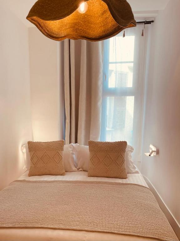 Katil atau katil-katil dalam bilik di Appartements Hotel le G