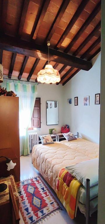 Posteľ alebo postele v izbe v ubytovaní La casa dei nonni