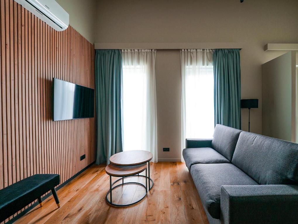 TV a/nebo společenská místnost v ubytování Hotel Mezza Notte