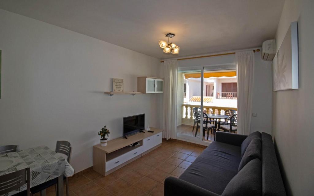 A seating area at Tres Playas Primera línea de mar - ALBERT VILLAS Alcossebre