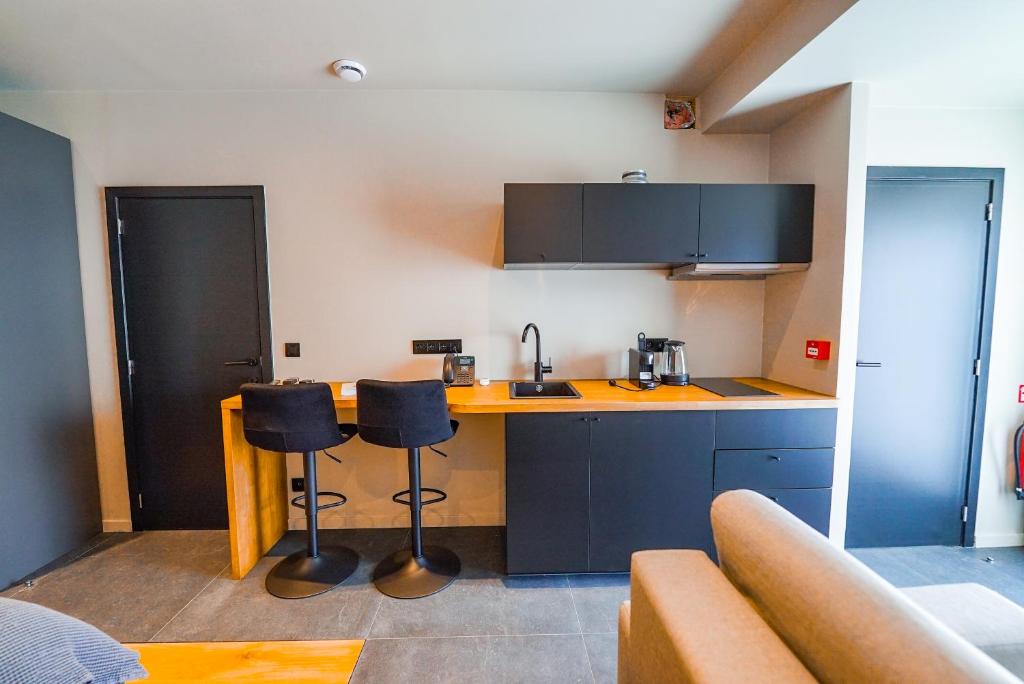 Kuchyň nebo kuchyňský kout v ubytování Hotel Mezza Notte