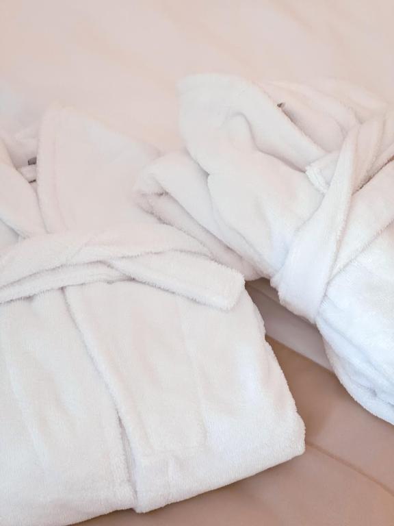 Postel nebo postele na pokoji v ubytování M26 Prémium apartmanok