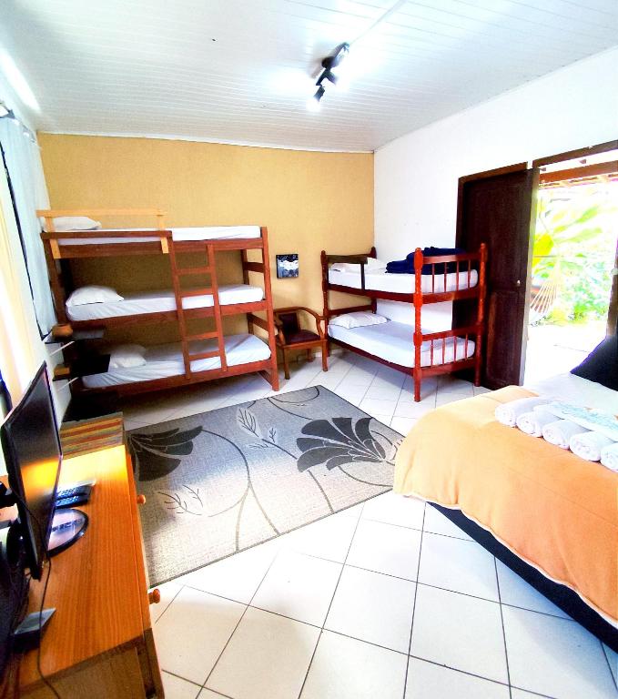 Postel nebo postele na pokoji v ubytování Pousada Lira Praieira Paraty