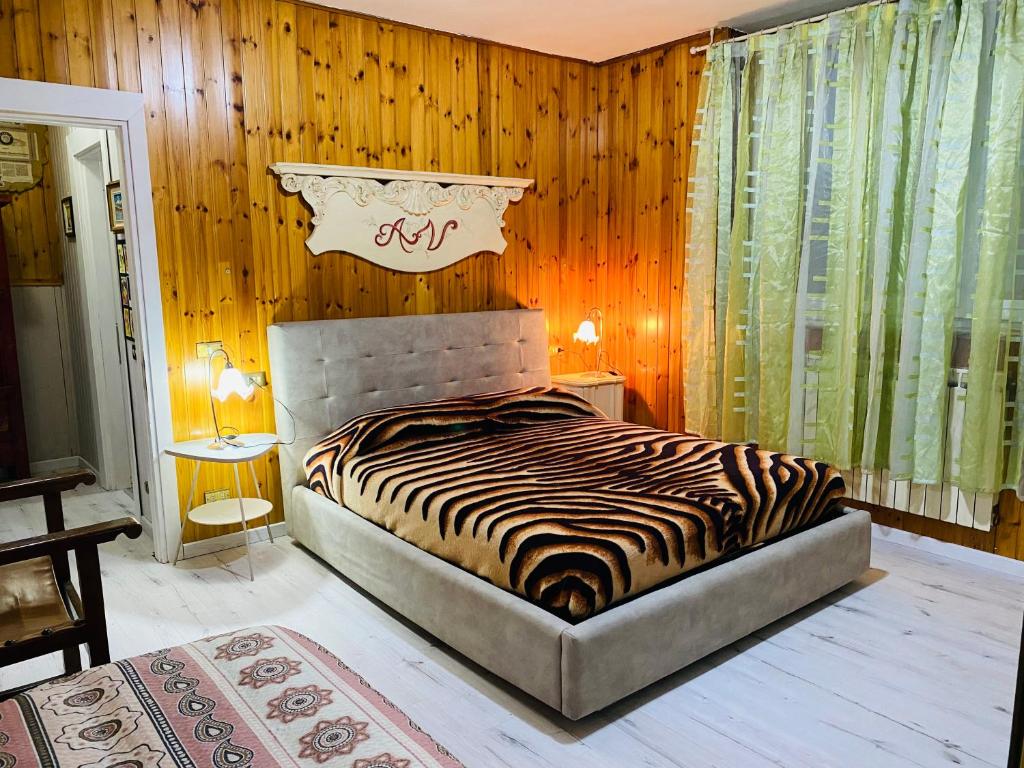 Postel nebo postele na pokoji v ubytování Flat with lake View e Garden