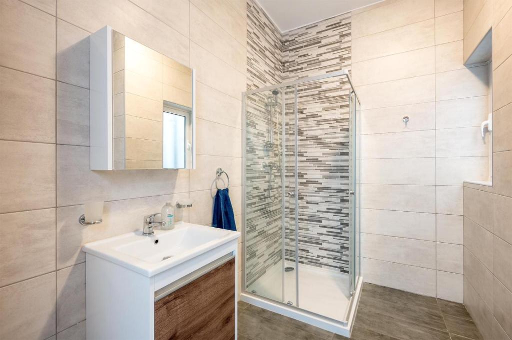 Koupelna v ubytování Msida Central Suites - EMMNIC Court