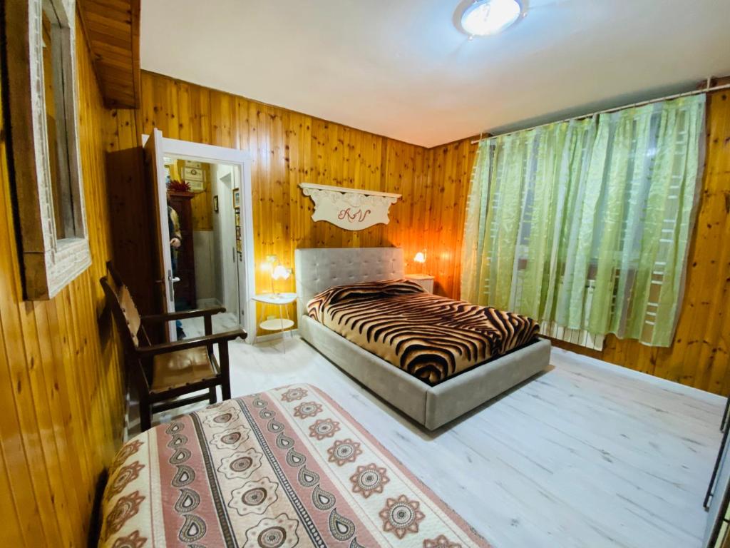 Postel nebo postele na pokoji v ubytování Flat with lake View e Garden