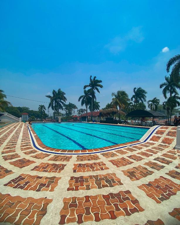 La alberca dentro o cerca de Hotel Sunrise By Hype