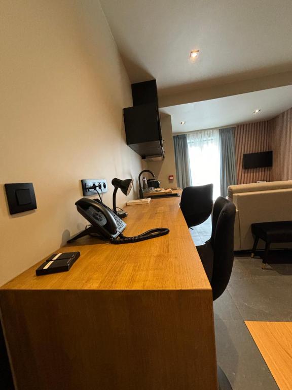 TV a/nebo společenská místnost v ubytování Hotel Mezza Notte