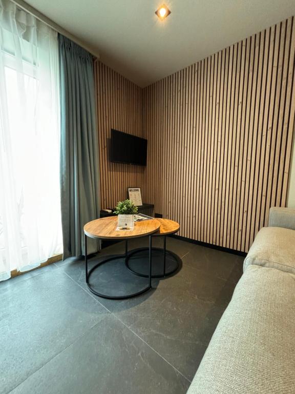 TV a/nebo společenská místnost v ubytování Hotel Mezza Notte