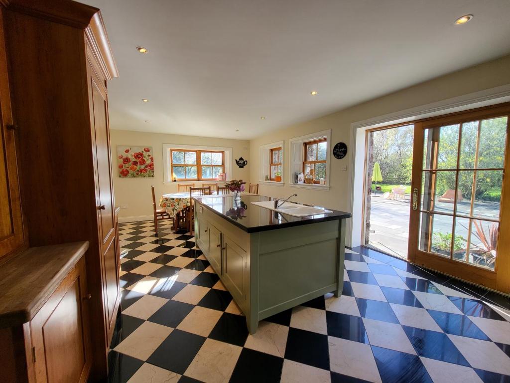 Kuchyň nebo kuchyňský kout v ubytování Reeks Country House