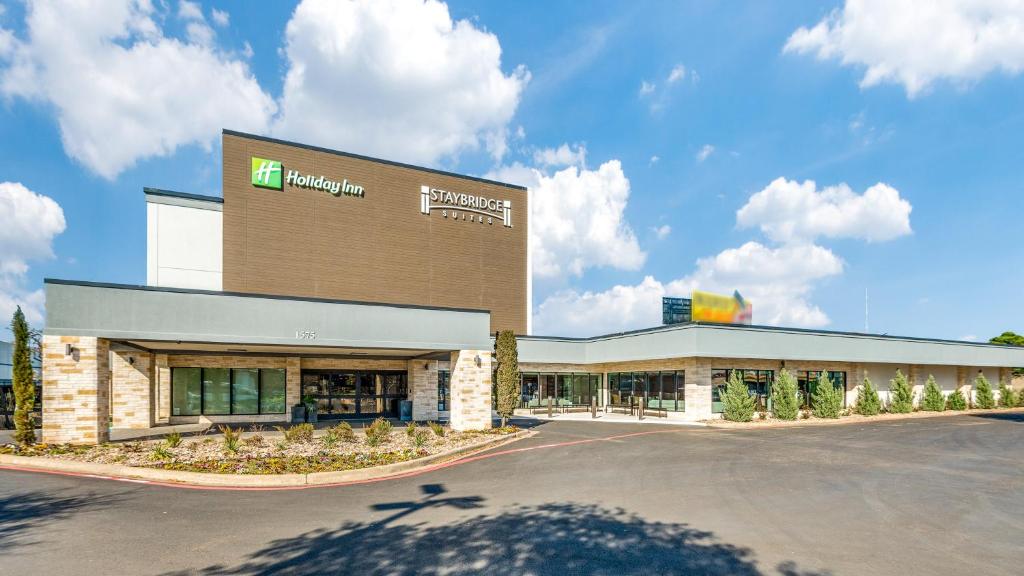 a front view of a shopping center at Staybridge Suites Dallas Market Ctr Love Field, an IHG Hotel in Dallas